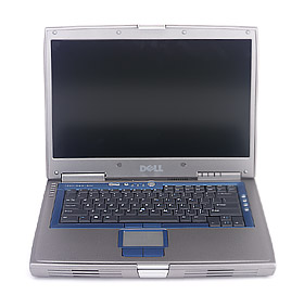 Dell Inspiron 8500.  The buttons are located just below the hinge of the LCD screen, slightly off to the left from the center of the laptop.
